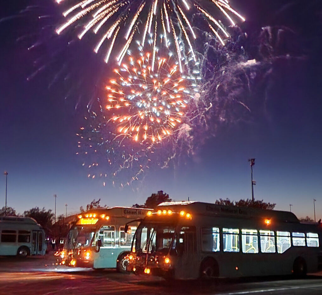 VVTA Buses with fireworks in the sky